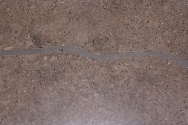 Crack routed with V-Blade and repaired with DiamaKrete Mortar